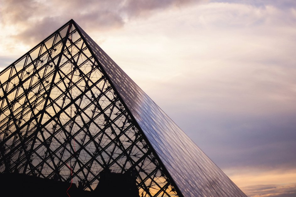 The Louvre Museum in Paris with glass pyramid entrance