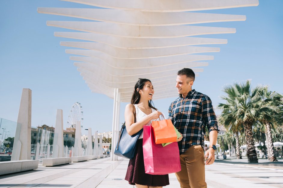 People shopping at markets and stores across Thailand
