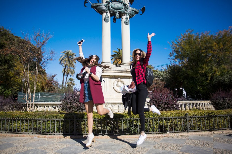 Tourists taking photos with the Unconditional Surrender statue in San Diego
