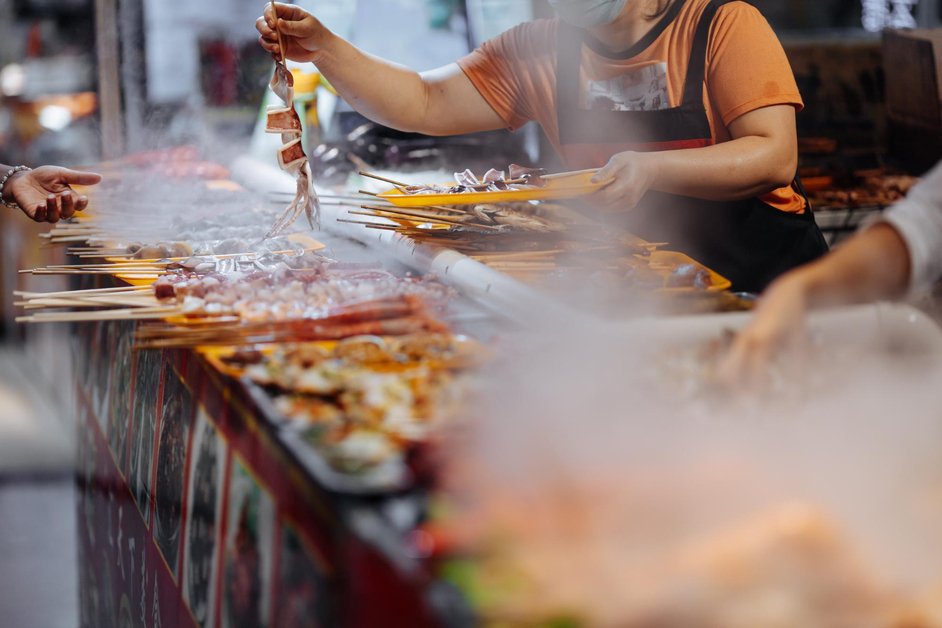 Street food tour in Thailand with local vendors and traditional dishes