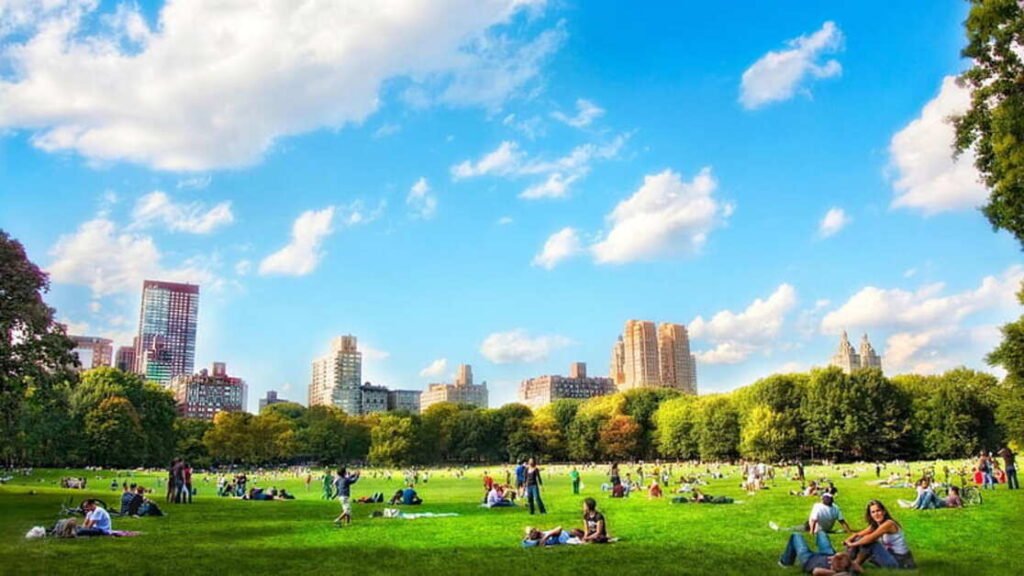 Hyde Park London with green lawns and walking paths