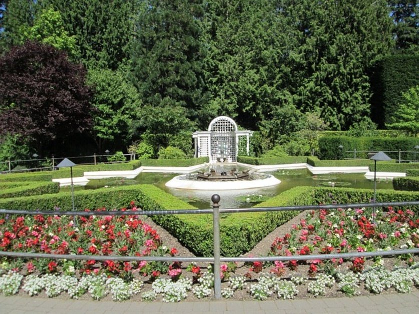 The Butchart Gardens in Victoria Canada with colorful flowers and landscaped gardens
