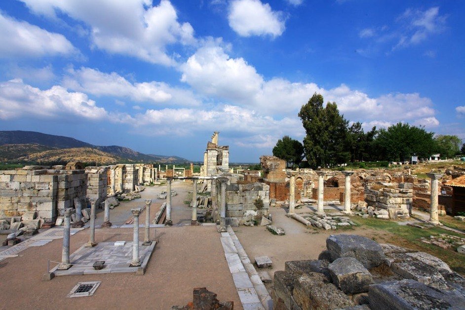 Ancient ruins of Ephesus in Turkey with historic marble streets and columns, showcasing one of the top things to do in Turkey.