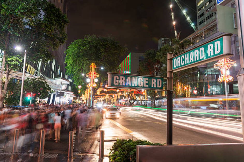 Shopping on Orchard Road in Singapore with luxury malls and vibrant city street